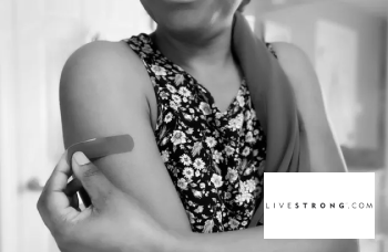 The Best Ways to Manage COVID Vaccine Side Effects, According to a Doctor
